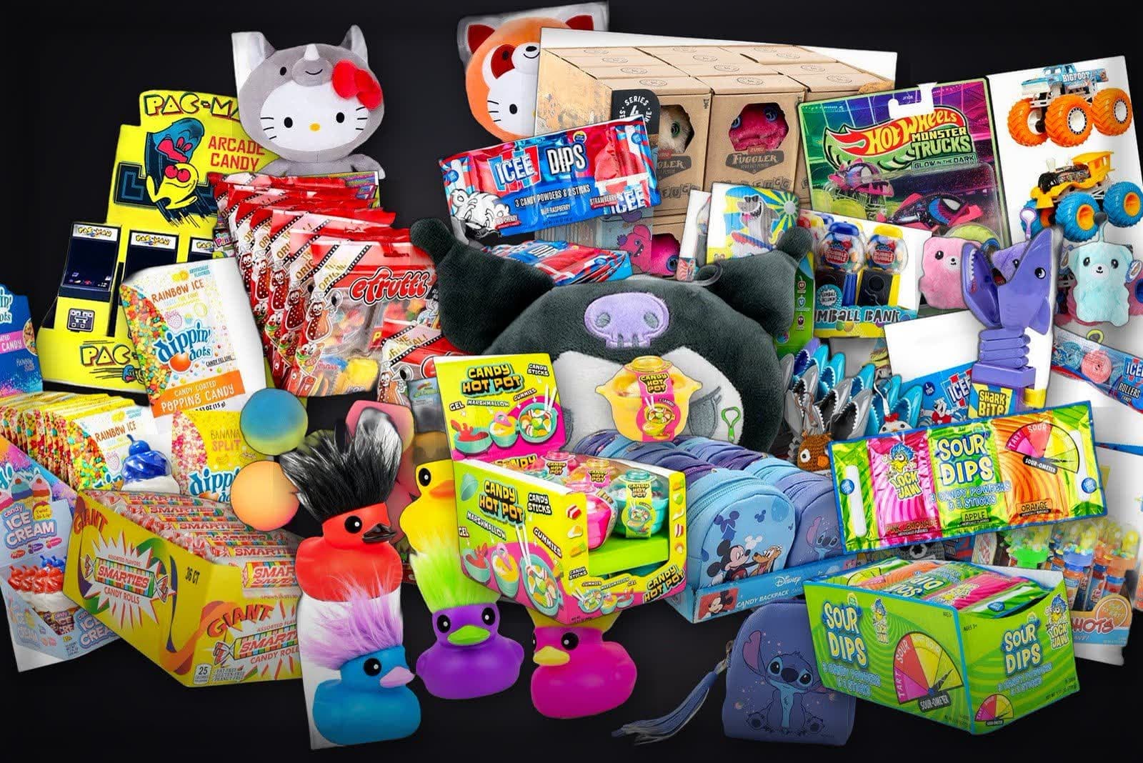 Prize counter haul of toys, plush, and candy at Laserdome